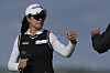 Kim A-lim of Korea bumps fists with her caddie after saving par on the 16th hole during the third round of the AIG Women's Open at Royal Porthcawl Golf Club in Porthcawl, Wales, on Aug. 2. [AP/YONHAP]