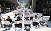 Naver union members hold a rally in the lobby of the company’s headquarters in Seongnam, Gyeonggi, on May 27 to protest the return of Choi In-hyuk, former chief operating officer, as head of the tech business division. [NEWS1]