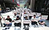Naver union members hold a rally in the lobby of the company’s headquarters in Seongnam, Gyeonggi, on May 27 to protest the return of Choi In-hyuk, former chief operating officer, as head of the tech business division. [NEWS1]