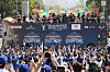 Los Angeles Dodgers players, family and staff ride on top of double-decker buses during a parade to celebrate the baseball team's World Series win on Nov. 3 in Los Angeles. [AP/YONHAP]