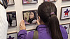 Family members of Madina Sherniyazova, a Kazakh student who died in the Itaewon crowd crush on Oct. 29, 2022, look at photos of the deceased at the ″House of Stars″ memorial for Itaewon crowd crush victims in Jongno District, central Seoul on Oct. 26. [KIM CHANG-YONG]