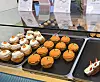 Small cakes on display at a bakery in Seoul in June [NOH YU-RIM]
