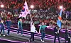 Korea's Choi Yong-beom, center, enters the 2024 Paris Paralympics Games closing ceremony at the Stade de France in Saint-Denis, France on Sunday with a Korean flag. [JOINT PRESS CORPS]