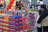 People look for Pepero snacks at a supermarket in Seoul on Sunday, a day before Pepero Day. [YONHAP]