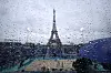 Rain is visible before the start of the men's beach volleyball tournament at Eiffel Tower Stadium in Paris on Saturday. [REUTERS/YONHAP]