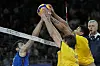 Darlan Ferreira Souza of Brazil, right, blocks the ball during the group B volleyball game against Italia at the Paris Olympics in Paris on Saturday. [AP/YONHAP]