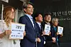 Choi Jae-young, second from left, the Korean American pastor who gifted a luxury handbag to first lady Kim Keon Hee, speaks to the press at the Gwacheon government complex as a civic group submitted a petition against President Yoon Suk Yeol, the first lady and Anti-Corruption and Civil Rights Commission Chairperson Yoo Cheol-hwan for alleged bribery and dereliction of duty on Monday. [YONHAP]