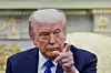 U.S. President Donald Trump gestures as he and Canada's Prime Minister Mark Carney, not pictured, meet in the Oval Office at the White House in Washington on Oct. 7. [REUTERS/YONHAP]
