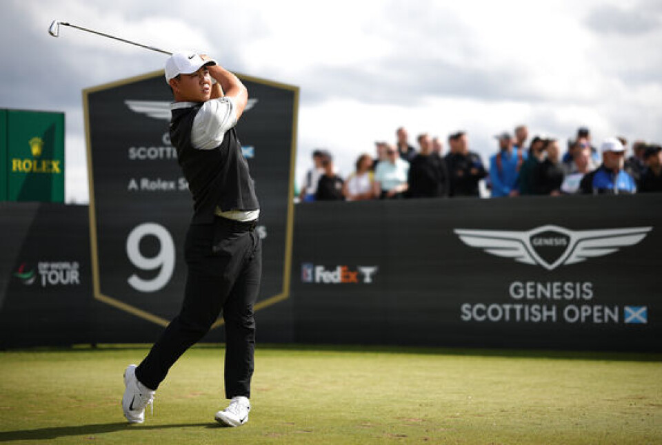 Tom Kim focused on the tee box during the first round of the Genesis Scottish Open at North Berwick.