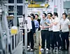 LG Chairman Koo Kwang-mo, center with the grey shirt, inspects LG Electronics' home appliance plant in Tennessee in June 2024. [YONHAP]