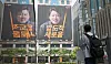 A passerby walks by Reform Party presidential candidate Lee Jun-seok's campaign office in Seocho District, southern Seoul, on May 13. [NEWS1]