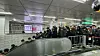 Passenger lines stretch long in the transfer passage between Subway Lines 1 and 2 at Sindorim Station in Guro District, western Seoul, on the morning of Jan. 13. [LEE GYU-RIM]