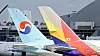 Korean Air and Asiana Airlines' planes are stationed at Incheon International Airport. [KIM SEONG-RYONG]