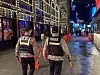 Patrol officers from the Seoul Metropolitan Police Precinct inspect Itaewon’s World Food Street in Yongsan District, central Seoul, at 6:25 p.m. on Oct. 24. Movable median barriers have been installed along the street to guide pedestrians to walk on the right side. [IM SEONG-BIN]
