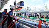 The 5,000-ton Coast Guard patrol vessel Sambong 5001, which guards the East Sea, including the Dokdo islets, supplies 600 tons of water to fire trucks at the unloading pier of Anin Thermal Power Plant in Gangneung, Gangwon, on Sept. 3. [YONHAP]