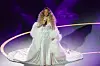 Mariah Carey performs at the opening ceremony of the 2026 Milan-Cortina Winter Olympics held at the San Siro stadium in Milan on Feb. 6. [KIM JONG-HO]