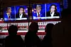 Viewers gather to watch a debate between Democratic presidential nominee Vice President Kamala Harris and Republican presidential nominee former President Donald Trump at the Angry Elephant Bar and Grill, Tuesday, Sept. 10, 2024, in San Antonio. (AP Photo/Eric Gay)