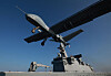 General Atomics' unmanned aerial vehicle prototype flies over a Dokdo-class amphibious assault ship on Nov. 12. [JOINT PRESS CORPS]