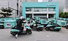 Baemin, food delivery bikes are parked in front of one of the company’s centers in Seoul. [YONHAP]