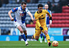 Wolverhampton Wanderers forward Hwang Hee-chan, right, vies for the ball during the FA Cup match against Blackburn Rovers at Ewood Park in England on Feb. 9. [REUTERS/YONHAP]