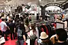 A crowd forms at Lotte Department Store in Jamsil, southern Seoul, in July to purchase luxury items during a promotional period. [YONHAP]