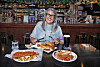 Irish Ambassador to Korea Michelle Winthrop poses with Irish dishes during an interview with the Korea JoongAng Daily at The Craic House in Yongsan District, central Seoul, on Aug. 21. [PARK SANG-MOON]
