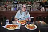 Irish Ambassador to Korea Michelle Winthrop poses with Irish dishes during an interview with the Korea JoongAng Daily at The Craic House in Yongsan District, central Seoul, on Aug. 21. [PARK SANG-MOON]