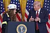 President Donald Trump talks with Kayla Blackford, a heavy equipment operator at Bear Run Mine near Carlisle, Indiana, during an event on coal power in the East Room of the White House, Wednesday, Feb. 11, 2026, in Washington. [AP/YONHAP]