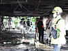 Police, firefighters and officials from the National Forensic Service conduct a joint inspection on July 18 at an apartment complex in Soha-dong, Gwangmyeong, Gyeonggi, where a fire in the parking lot the previous day resulted in multiple casualties. [YONHAP]