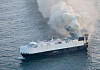 Smoke rises from a fire aboard the cargo vessel Morning Midas, carrying around 3,000 vehicles, including 800 electric vehicles, as seen in an aerial photograph taken from a U.S. Coast Guard C-130J Super Hercules, approximately 300 miles south of Adak, Alaska, U.S. June 3, 2025. [REUTERS/YONHAP]