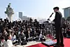 Former conservative People Power Party (PPP) leader Han Dong-hoon announces his bid for the presidential race in front of the National Assembly in Yeouido, western Seoul, on April 10. [YONHAP]