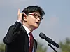 Former conservative People Power Party (PPP) leader Han Dong-hoon announces his bid for the presidential race in front of the National Assembly in Yeouido, western Seoul, on April 10. [YONHAP]