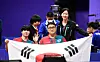 Korea's Jang Young-jin, left, and Joo Young-dae pose after winning the final of the MD 4 mixed doubles table tennis at the 4th Asian Para Games in Hangzhou China on Friday. [NEWS1]