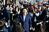 Former President Yoon Suk Yeol greets supporters as he exits the Hannam-dong presidential residence in Yongsan District in central Seoul on the April 11. [JOINT PRESS CORPS]