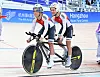 Korea's Kim Jung-been, left, competes with pilot Yang Joong-hun in men's cycling B at the 4th Asian Para Games in Hangzhou, China. [대한장애인체육회]