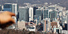 Buildings in a major business district are seen from Mount Namsan in central Seoul on Feb. 21. [YONHAP]