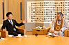 Unification Minister Chung Dong-young, left, talks to Na Sang-ho, head of Won Buddhism, during a meeting in Seoul on Dec. 17, in this photo provided by the Ministry of Unification. [YONHAP