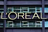 The logo of French cosmetics group L'Oreal is seen on the L'Oreal group's headquarters building in Clichy, near Paris, France on April 14. [REUTERS/YONHAP]