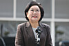 Lee Hye-hoon, the nominee for the new minister for planning and budget, talks to reporters while heading to her office to prepare for her parliamentary confirmation hearing in central Seoul on Dec. 29. [YONHAP]
