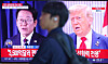 A TV screen at Seoul Station, in the center of the capital, on July 31 shows a report that U.S. President Donald Trump's administration has agreed to impose 15 percent tariffs on Korea, 10 percentage points lower than what was proposed, under a trade deal that would charge America no tariffs. [YONHAP]