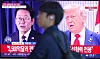 A TV screen at Seoul Station, in the center of the capital, on July 31 shows a report that U.S. President Donald Trump's administration has agreed to impose 15 percent tariffs on Korea, 10 percentage points lower than what was proposed, under a trade deal that would charge America no tariffs. [YONHAP]