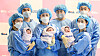 Nurses hold three babies born at midnight, accompanied by their fathers, at CHA University Ilsan Medical Center in Goyang, Gyeonggi, on Jan. 1. [CHA UNIVERSITY ILSAN MEDICAL CENTER]