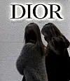 Two women walk past a Dior store in Jung District, central Seoul on Jan. 12, 2023. [NEWS1]