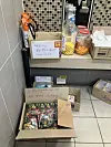 Free items, comprised of disposable hand warmers, face masks, snacks and light sticks arranged in a corner of the National Assembly Station's bathroom on Dec. 14 [SCREEN CAPTURE]