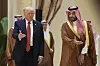 U.S. President Donald Trump, left, arrives with Saudi Crown Prince Mohammed bin Salman for the group photo with Gulf Cooperation Council leaders during the Gulf Cooperation Council Summit in Riyadh, Saudi Arabia, on May 14. [AP/YONHAP]