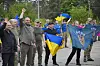 Ukrainian commanders with Ukrainian Defence Minister Rustem Umerov, third from left, welcome prisoners of war following a prisoner swap at an undisclosed location, Ukraine, May 24. [EPA/YONHAP]