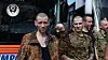 Ukrainian POWs pose after their exchange, amid the Russian invasion in Ukraine on May 23. [AFP/YONHAP]