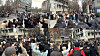 Passersby get a glimpse of K-pop groups TIOT and Kiiras in a flash mob in the Insa-dong area of Jongno District, central Seoul, on Dec. 12. [WORLD K-POP CENTER]