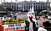 Pro-Yoon Suk Yeol protesters hold Korean and American flags and demand the Constitutional Court dismiss the impeachment case against Yoon in front of the court in central Seoul on March 18. [NEWS1]