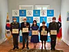 Nils Steen Egelien, president of the Norwegian Korean War Veterans Association, second from left, and Korean Ambassador to Norway Nam Young-sook pose during a ceremony to present the masks to Korean War veterans at the embassy in Oslo on June 15. [EMBASSY OF KOREA IN NORWAY]